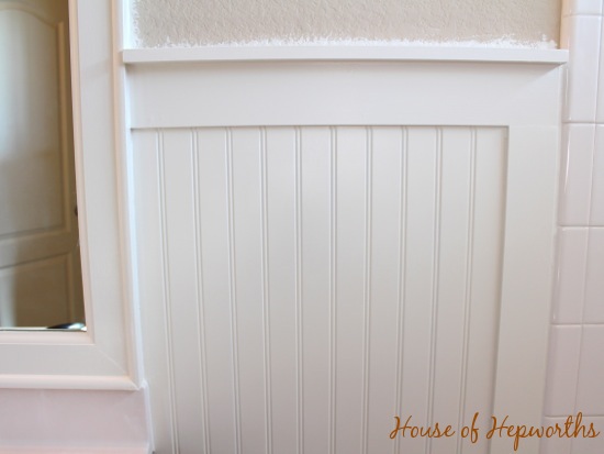 An Easy DIY Beadboard Hook Wall In The Kids' Bathroom