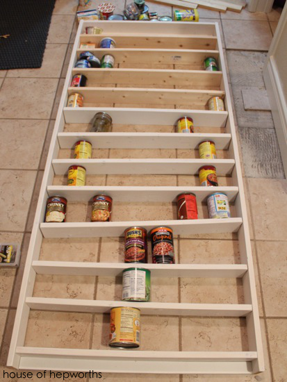 https://images.houseofhepworths.com/2014/11/24CannedGoodsTV/canned_goods_shelf_tv_hoh_1.jpg