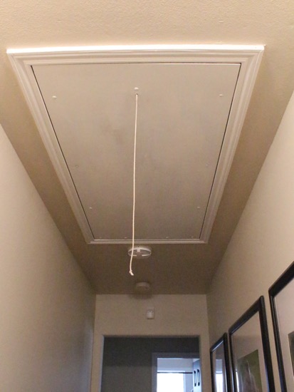 Get Rid Of That Ugly Cord Hanging From Your Attic Stairs