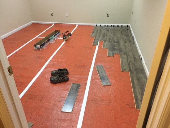 Laminate Flooring In Ben S Basement, How To Lay Laminate Flooring In A Basement